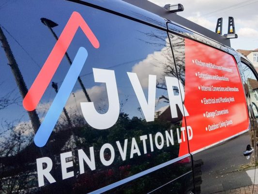 Cut vinyl graphics on van