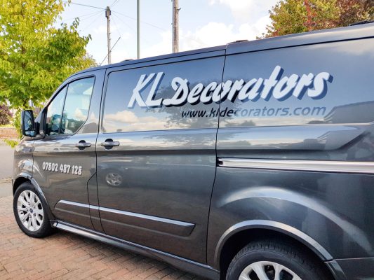 Cut vinyl van lettering with shadow